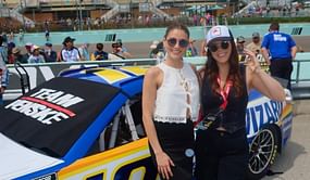 Gianna's racetrack OOTD features colorblocked top and slit skirt combo as she cheers for husband Ryan Blaney at the Straight Talk Wireless 400