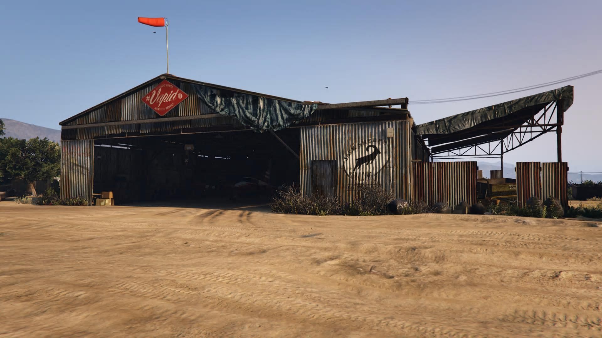 Here&#039;s how to buy the McKenzie Field Hangar in GTA Online (Image via Rockstar Games)