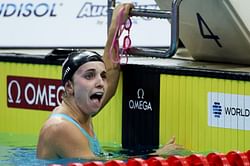 Regan Smith reacts as she receives massive support from fans during TYR Pro Swim Series