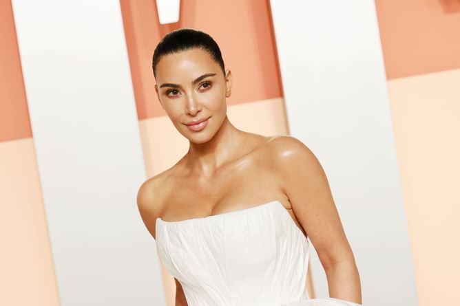 "She has fulfilled the prophecy" - Internet reacts to Kim Kardashian and her Tesla robot's PDA-filled photoshoot for Perfect Magazine
