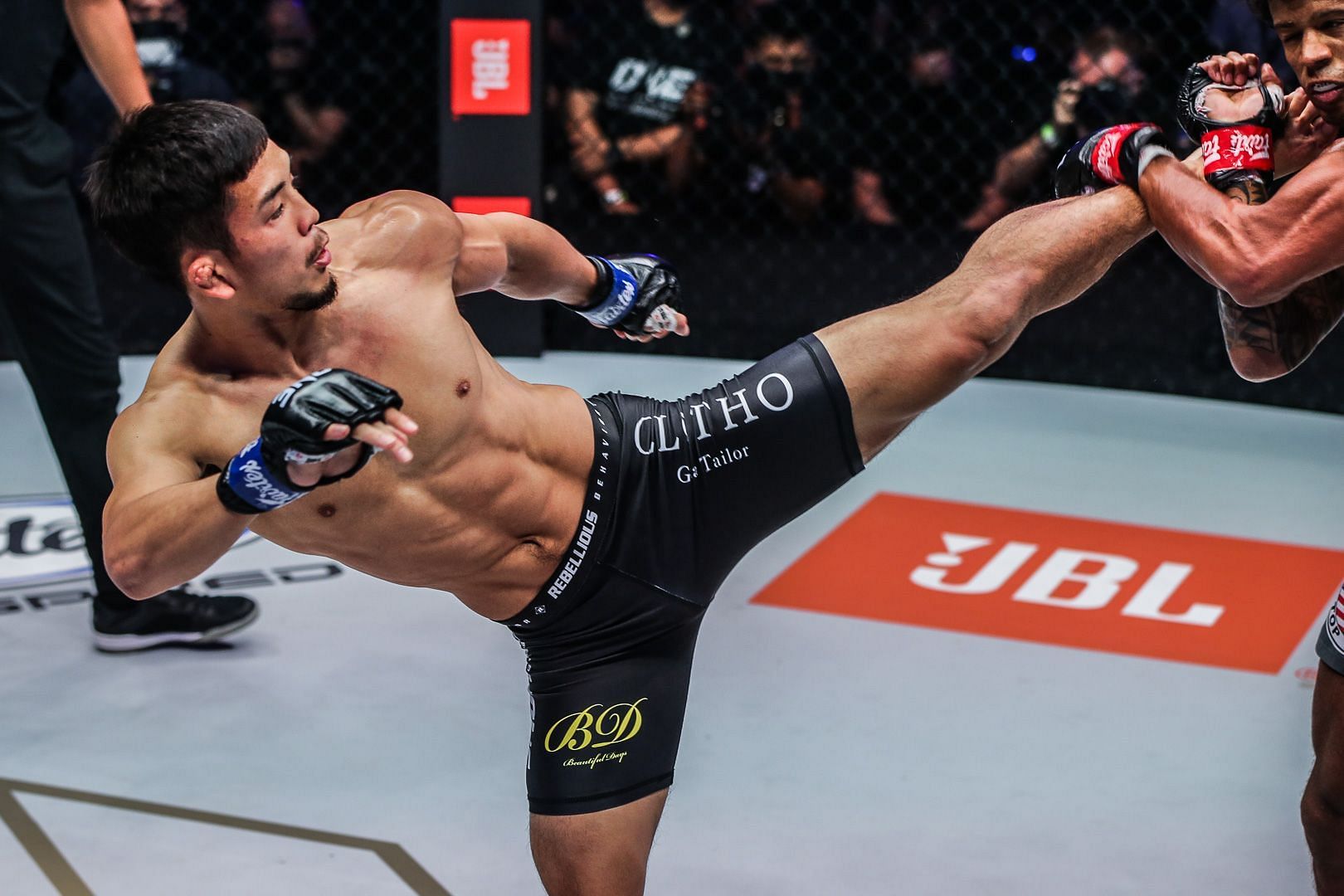 Yuya Wakamatsu kicks Adriano Moares in their first encounter [Photo via ONE Championship]