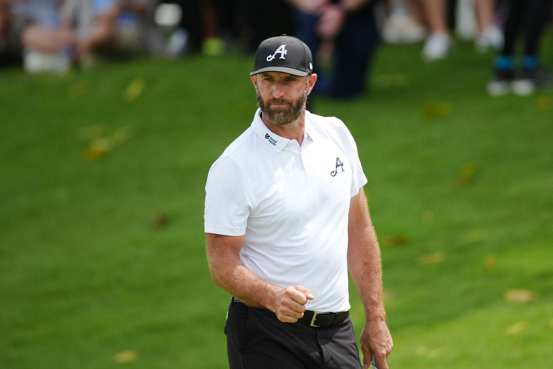 Dustin Johnson of 4 Aces GC celebrates at the 9th green on day two of LIV Golf Singapore at Sentosa Golf Club (Image Source: Getty)