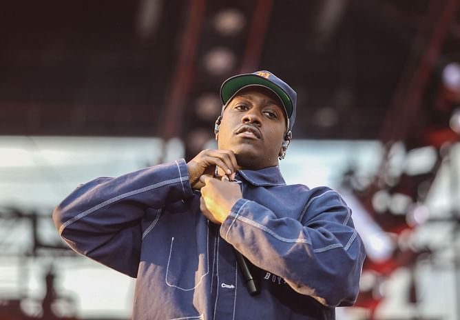 WATCH: $25 million rapper strips off Dodgers jersey at San Diego concert, swaps it with Padres jersey to send fans wild