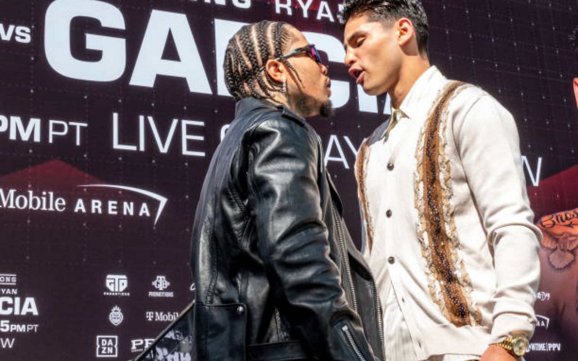 Ryan Garcia (right) slams Gervonta Davis (left). [Image courtesy: Getty]