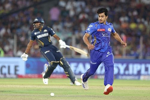 Satyanarayana Raju chasing a delivery off his bowling - Source: Getty