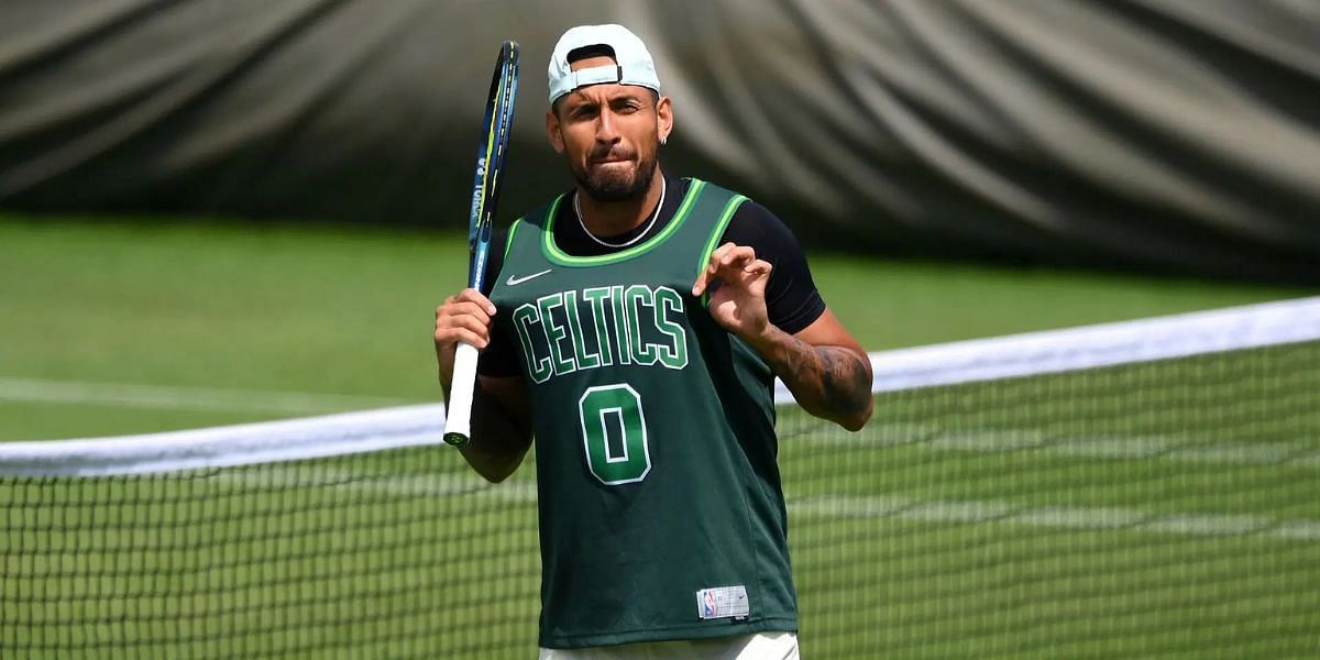 Nick Kyrgios wearing a Boston Celtics jersey | Getty