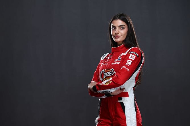 Victoria's Secret model and NASCAR racer Toni Breidinger channels chic aesthetic in red tank top and wide leg jeans at Celsius event