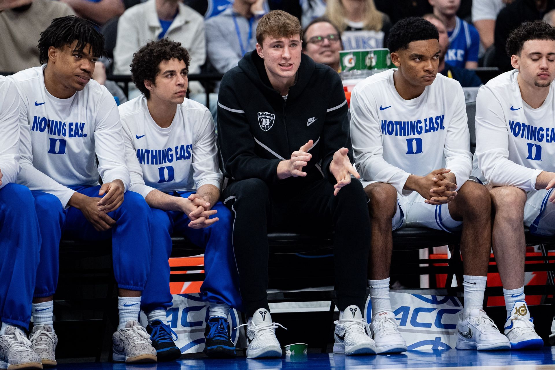 Cooper Flagg (#2) of the Duke Blue Devils looks on from the bench in the first half against the North Carolina Tar Heels at Spectrum Center. Photo: Getty