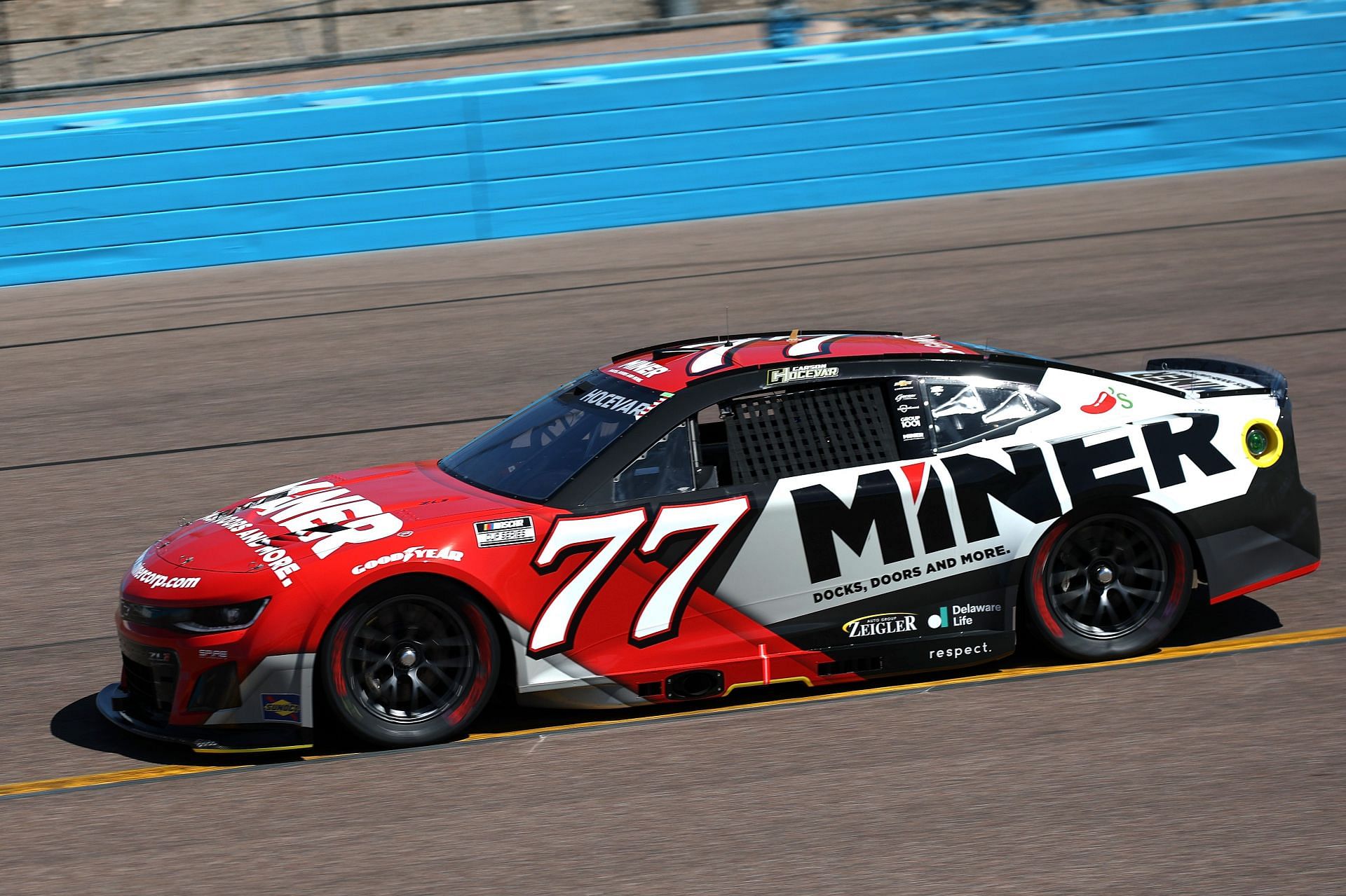 Carson Hocevar, driver of the #77 Miner Docks Doors and more Chevrolet, drives during practice for the NASCAR Cup Series Shriners Children&#039;s 500 at Phoenix Raceway on March 08, 2025 in Avondale, Arizona. - Source: Getty