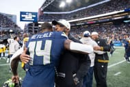 DK Metcalf, left, Mike Tomlin, right, during Pittsburgh Steelers vs. Seattle Seahawks - Source: Getty