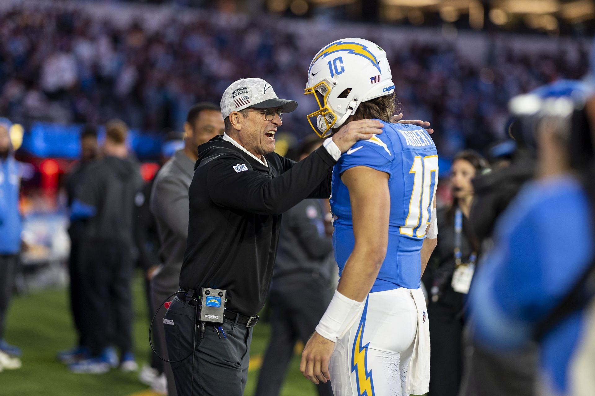 INGLEWOOD, CALIFORNIA - NOVEMBER 17: Head coach Jim Harbaugh of Los Angeles Chargers and Justin Herbert #10 of the Los Angeles Chargers react during an NFL Football game against the Cincinnati Bengals at SoFi Stadium on November 17, 2024 in Inglewood, California. (Photo by Michael Owens/Getty Images) - Source: Getty