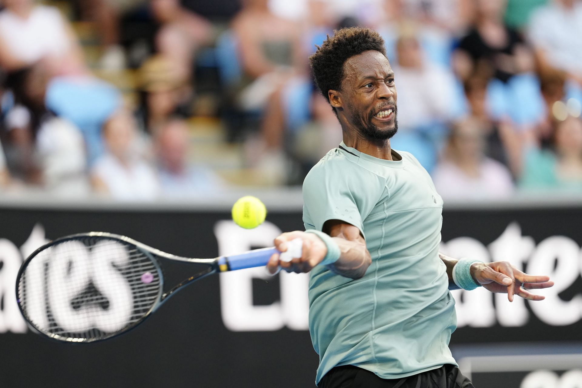 Monfils hits a forehand in Melbourne | Image Source: Getty