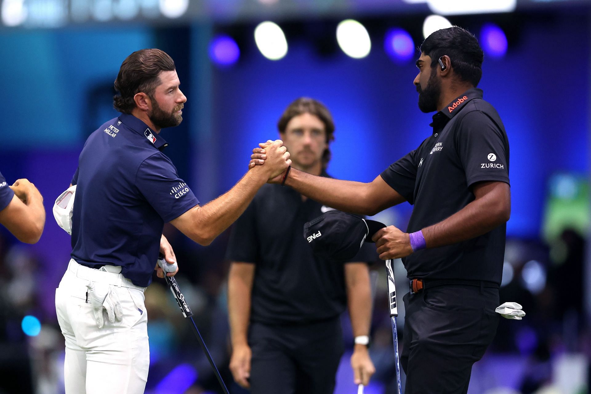 Cameron Young and Sahith Theegala shake hands at the TGL semifinals (Image Source: Getty)