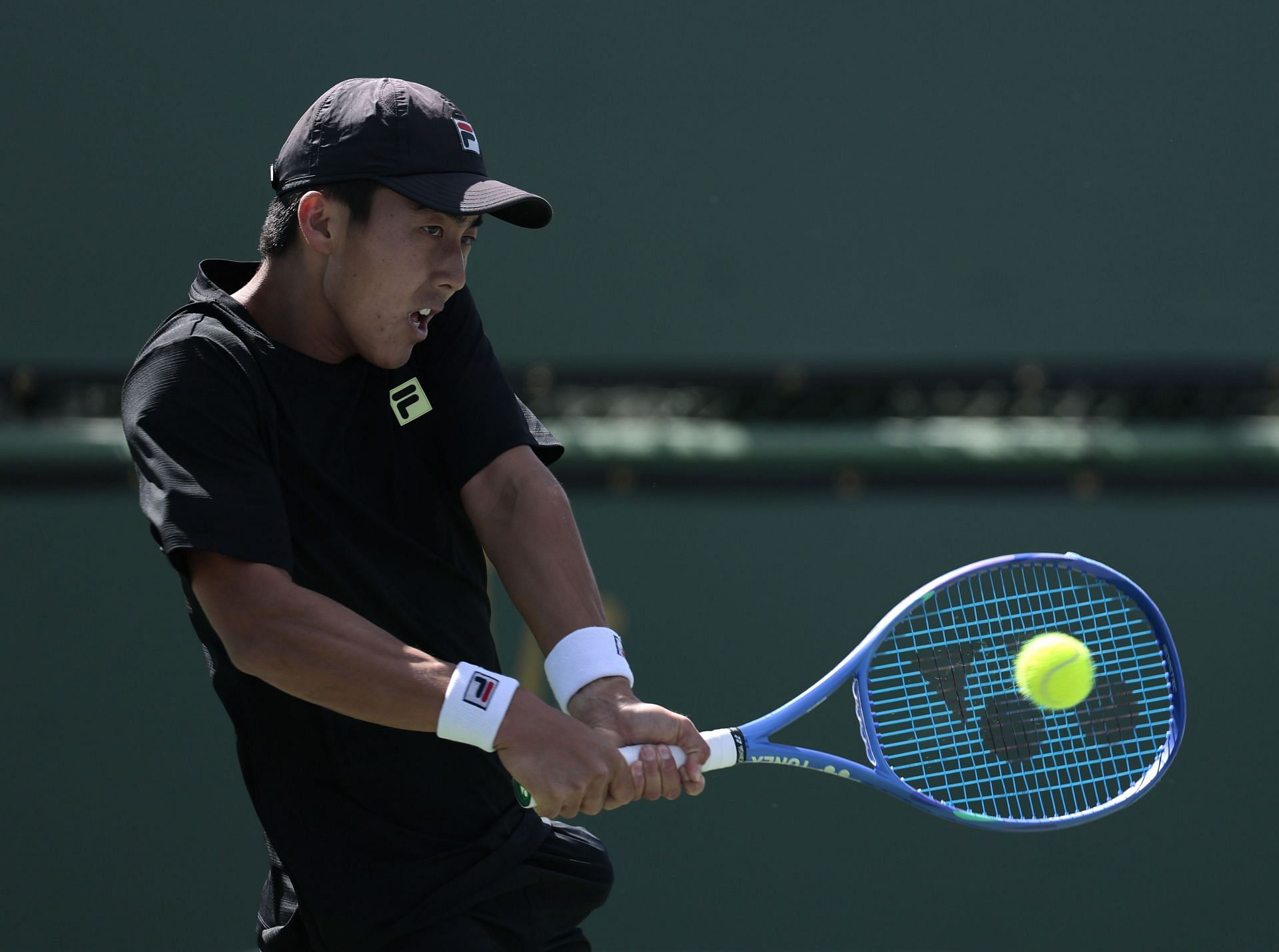 Rinky Hijikata hits a backhand | Image Source: Getty