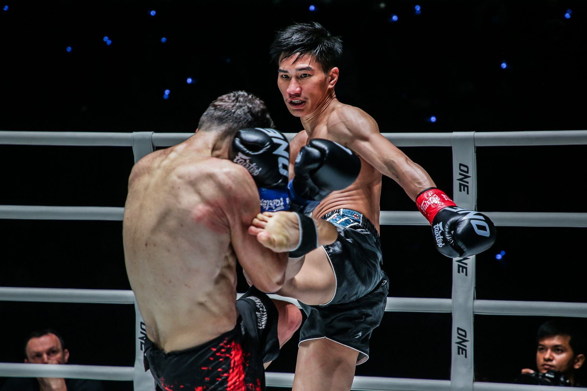 Tawanchai (right) breaks Davit Kiria