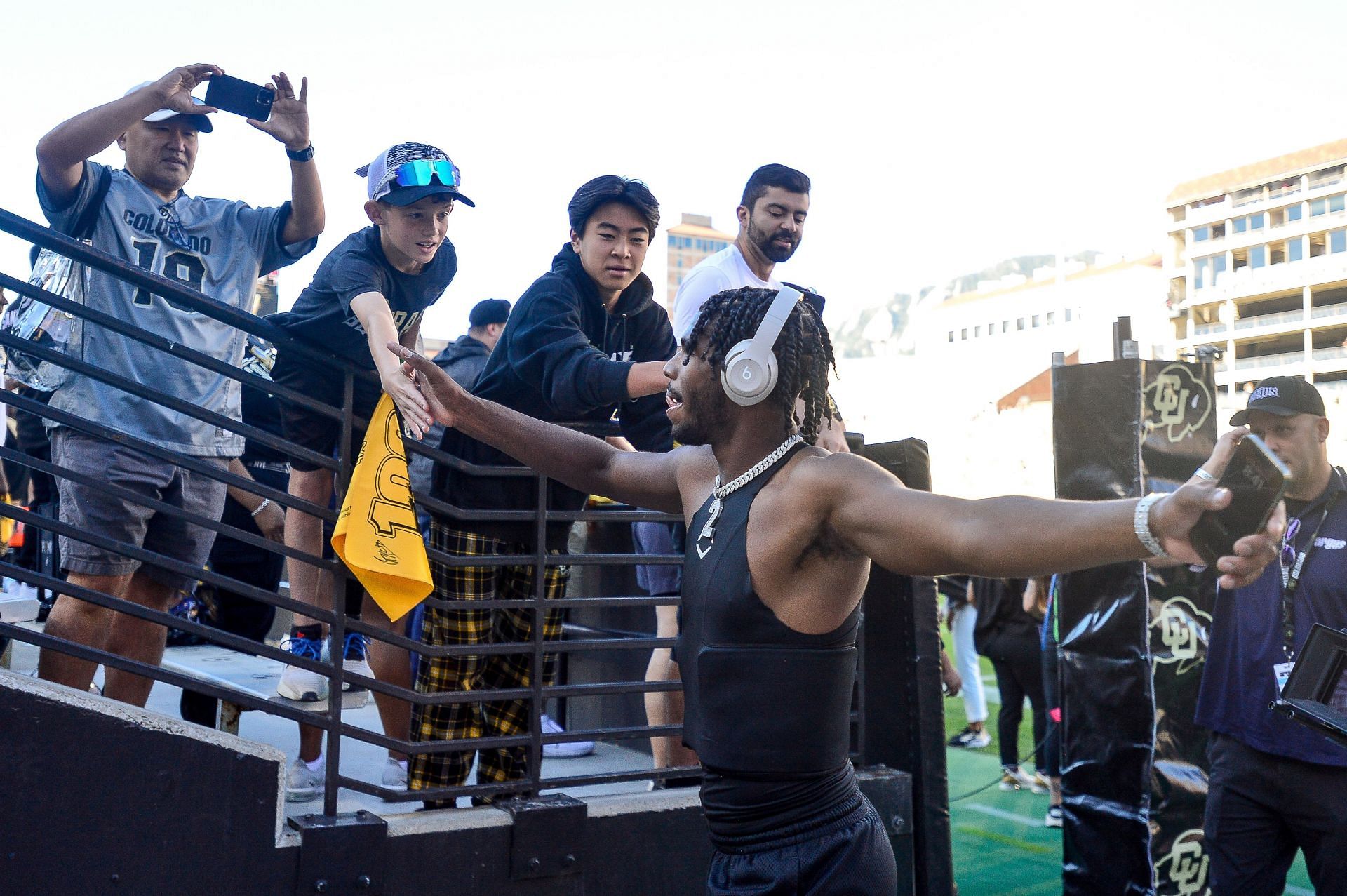 Shedeur Sanders #2 of the Colorado Buffaloes greets fans as he warms up before a game against the Nebraska Cornhuskers at Folsom Field - Source: Getty