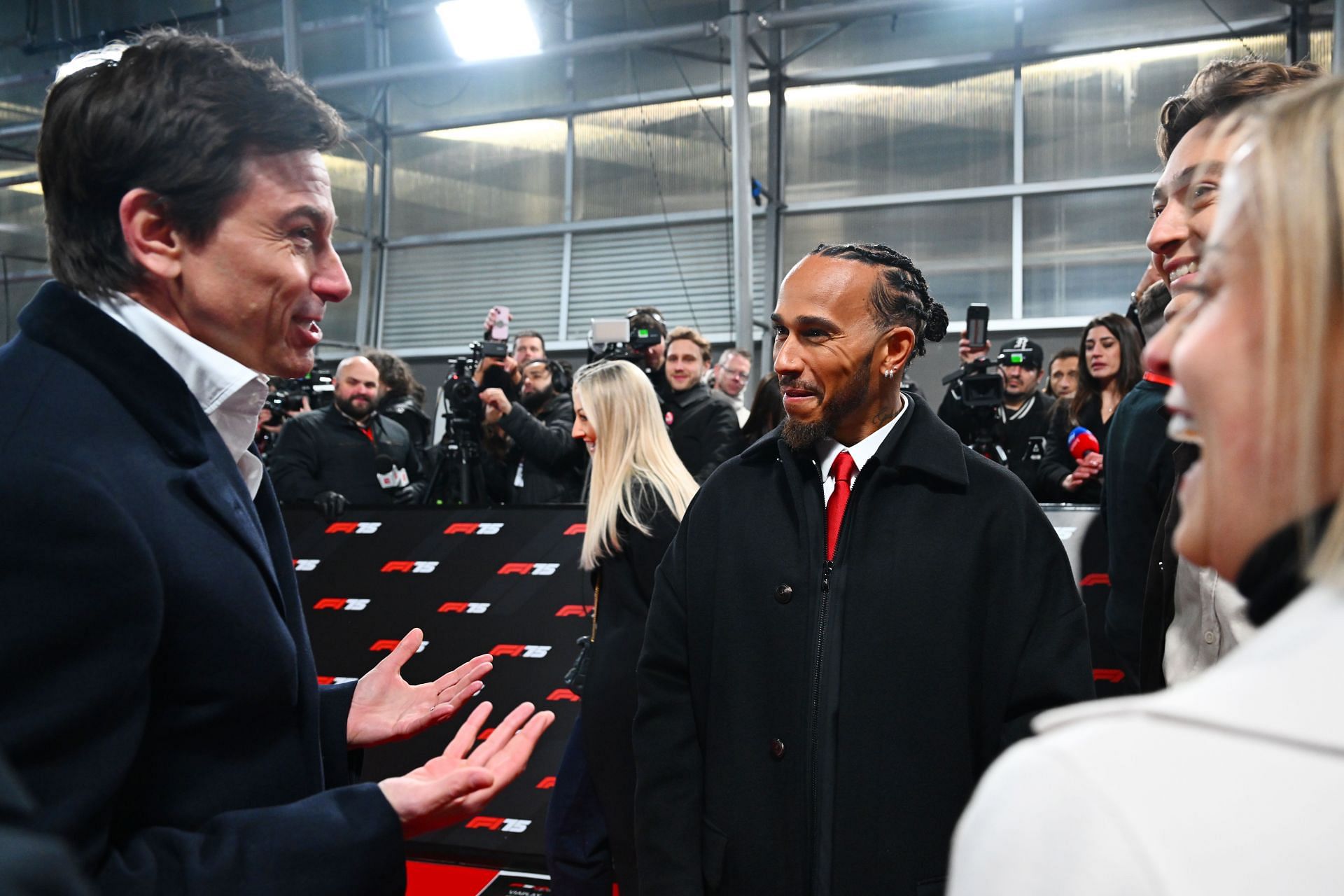 Toto Wollf, Susie Wollf and George Russell having a conversation with Lewis Hamilton at the F1 75 Live - Source: Getty