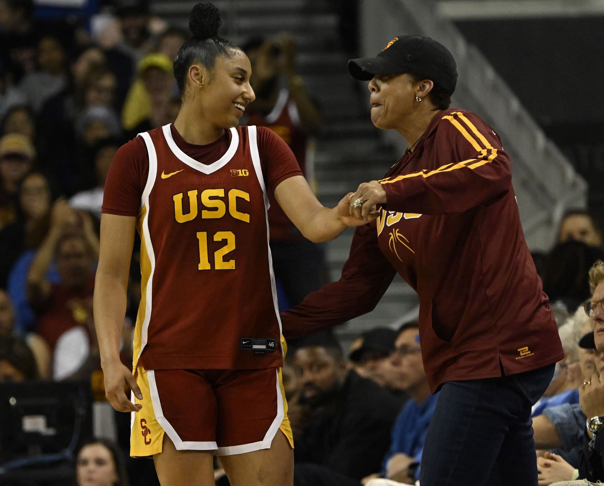 USC Trojans defeated the UCLA Bruins 80-67 to win a NCAA women