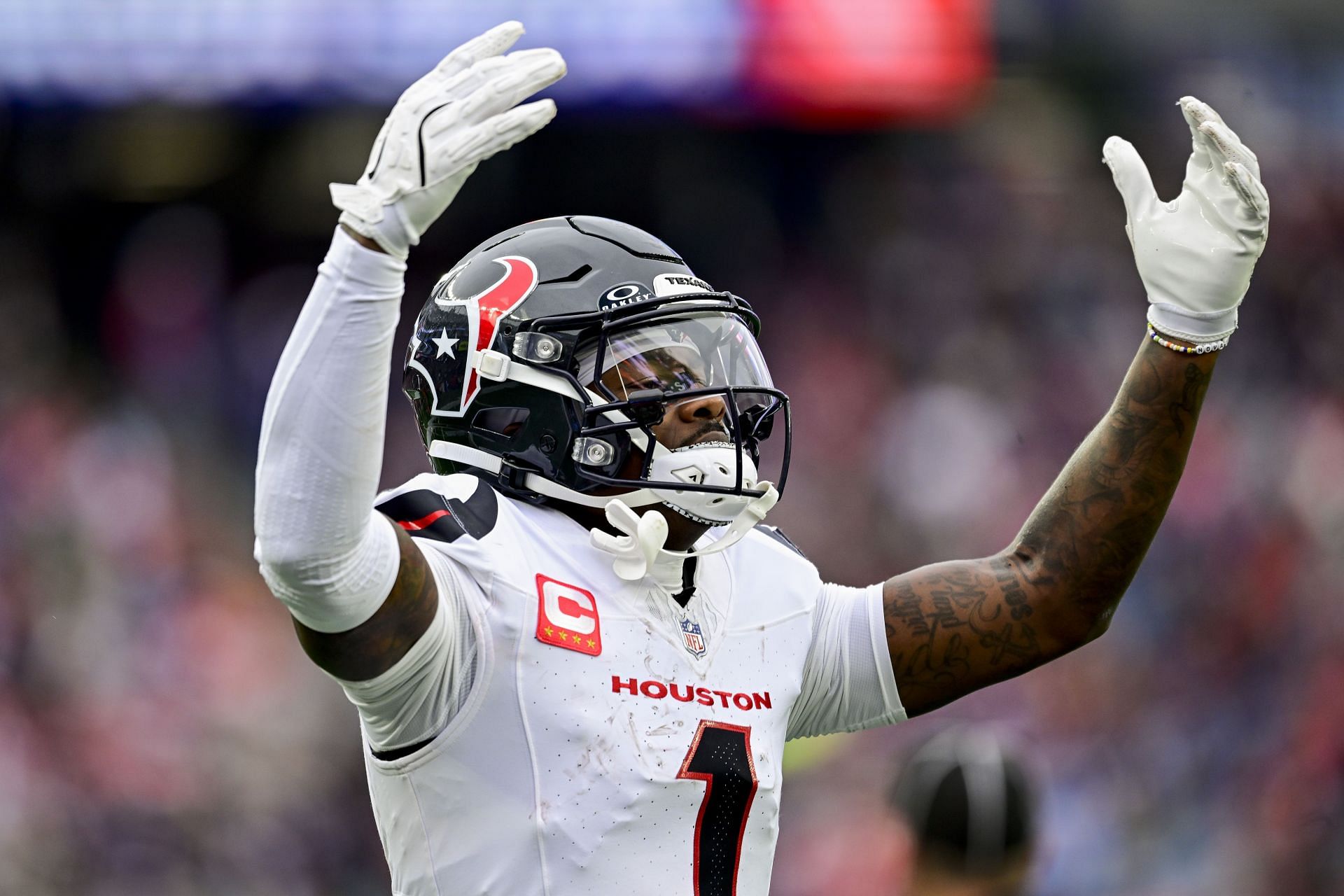 FOXBOROUGH, MASSACHUSETTS - OCTOBER 13: Stefon Diggs #1 of the Houston Texans celebrates after scoring a touchdown against the New England Patriots during the third quarter of the game at Gillette Stadium on October 13, 2024 in Foxborough, Massachusetts. (Photo by Maddie Malhotra/Getty Images) - Source: Getty