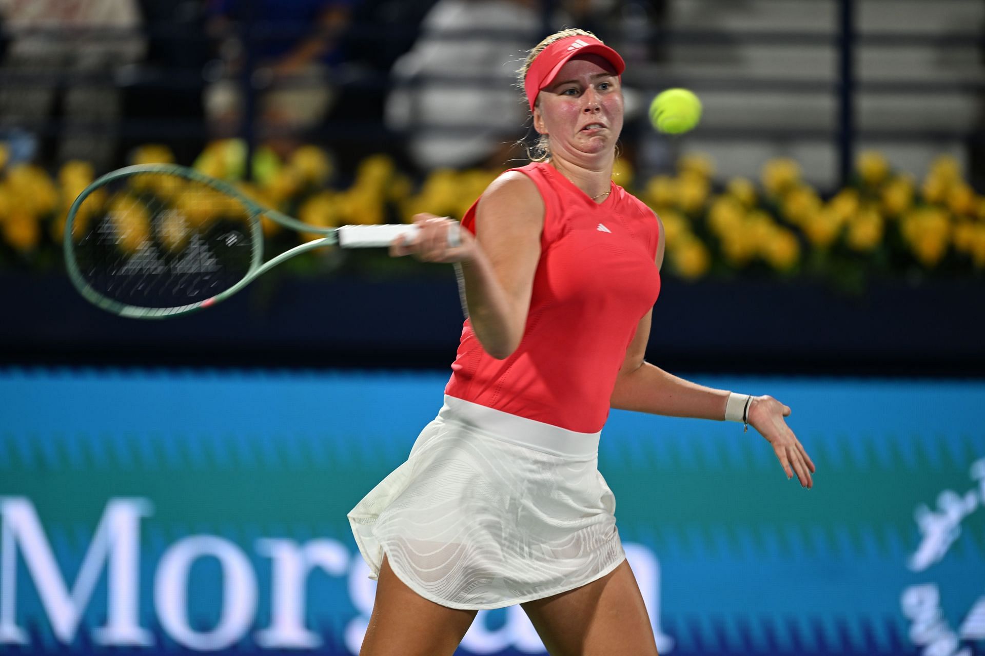 Clara Tauson hits a forehand during 2025 Dubai final | Image Source: Getty