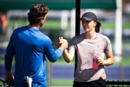 Wim Fissette (L) and Iga Swiatek during a practice session at the 2025 BNP Paribas Open (Source: Getty)
