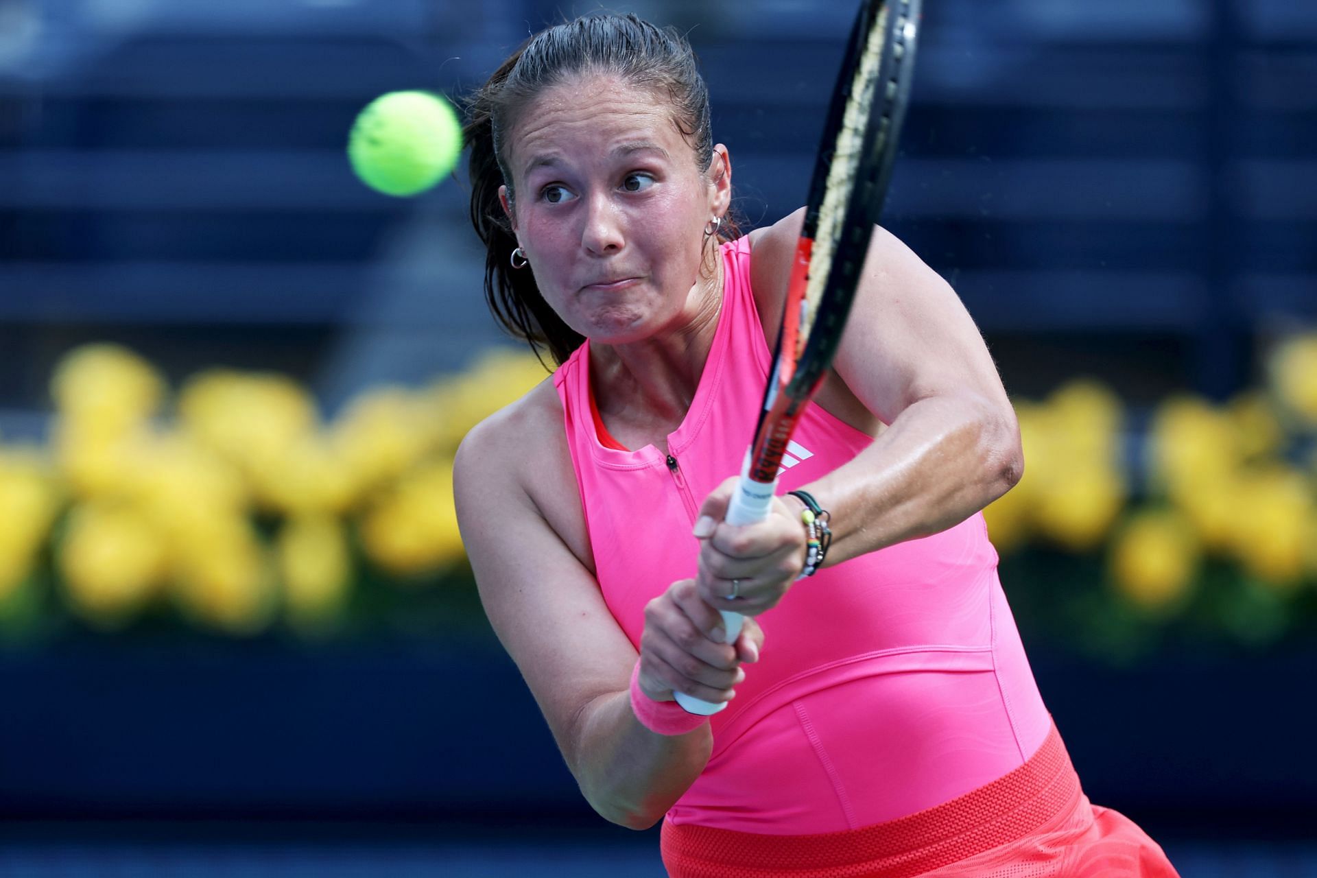 Daria Kasatkina plays a backhand against Sorana Cirstea of Romania in their first round match during day two of the Dubai Duty Free Tennis Championships - Source: Getty