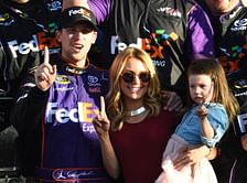 Denny Hamlin’s fianceé flaunts her baby bump in an all-black dress at Homestead-Miami