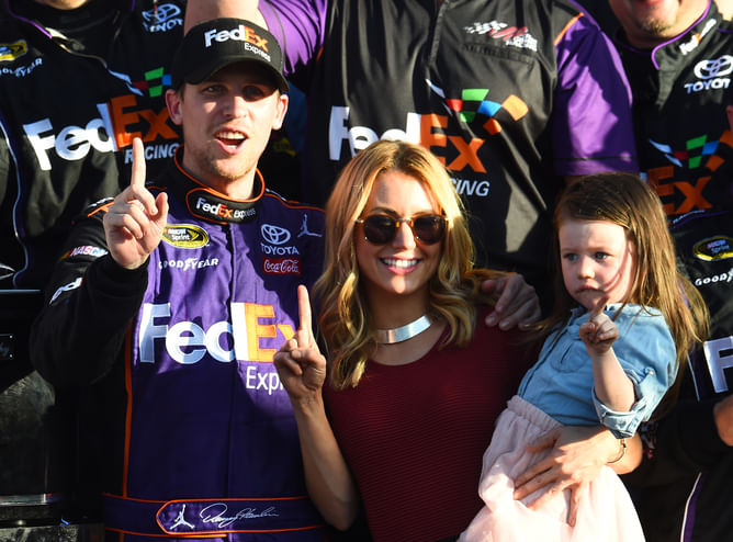 Denny Hamlin’s fianceé flaunts her baby bump in an all-black dress at Homestead-Miami