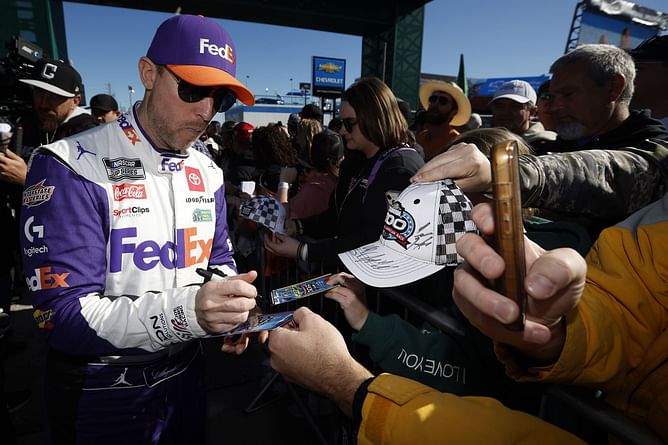 Martinsville winner Denny Hamlin spotted signing autographs for fans after the race