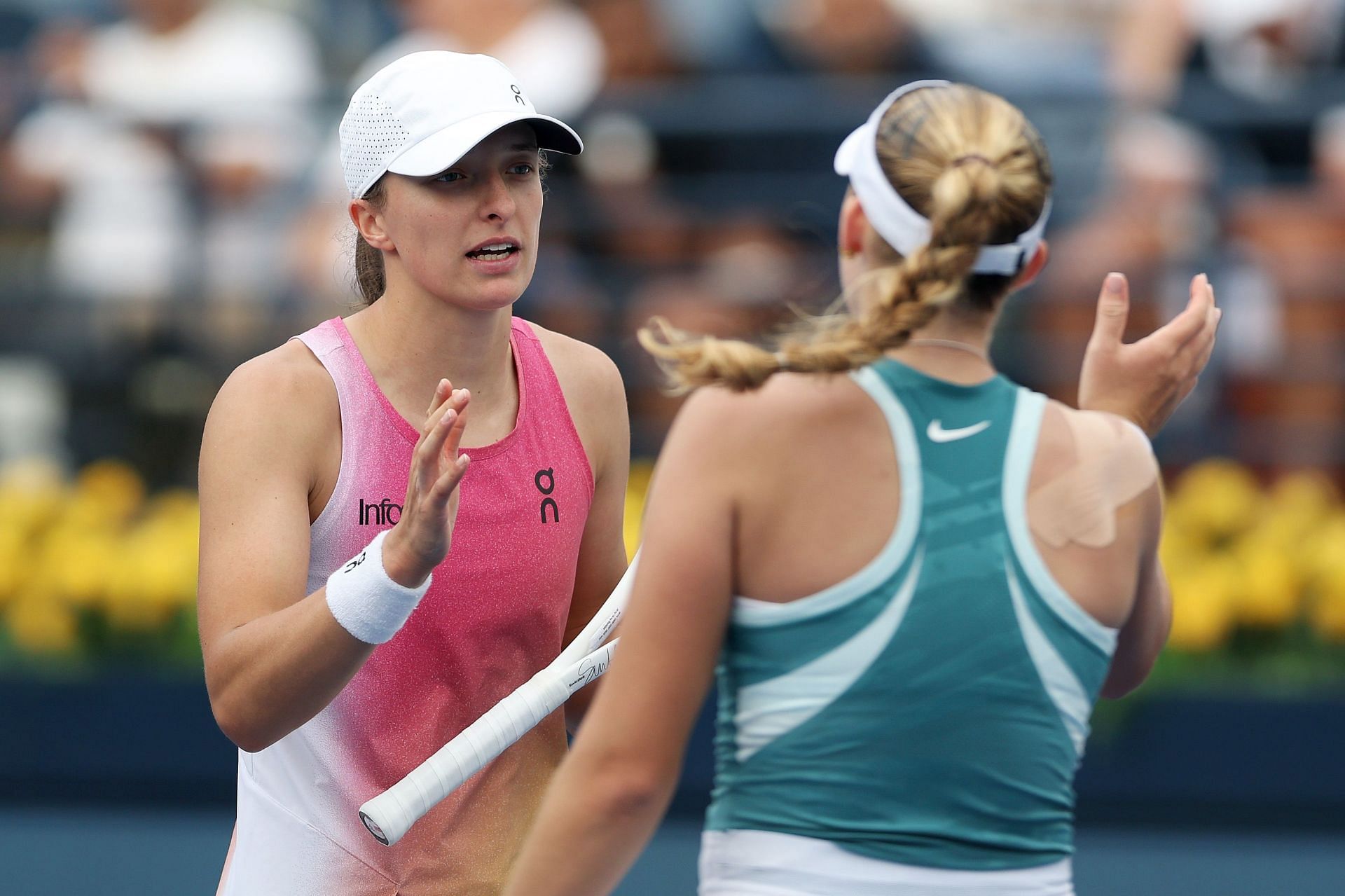 Iga Swiatek (L) pictured with Mirra Andreeva at the 2025 Dubai Tennis Championships - Image Source: Getty