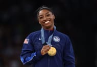 Simone Biles of Team United States celebrates on the podium during the Olympic Games 2024 in Paris, France. (Photo by Getty Images)