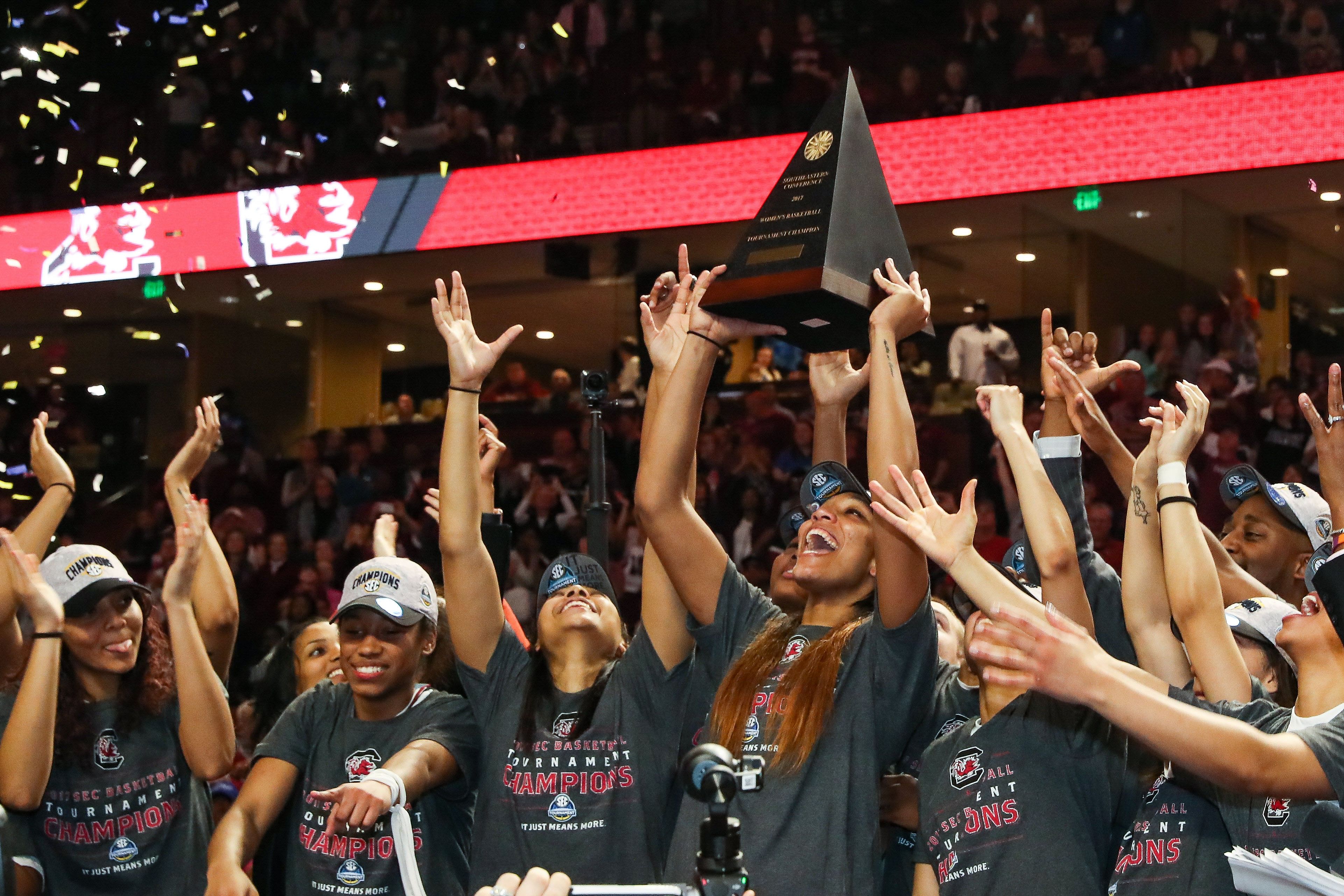 South Carolina Gamecocks forward A&#039;ja Wilson (22) holds up the trophy after they won the 2017 SEC Tournament at Secours Wellness Arena. Photo: Imagn