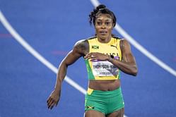 Elaine Thompson-Herah turns up the glamor in a stunning black and wine-colored outfit as she steps out amid Indoor track season