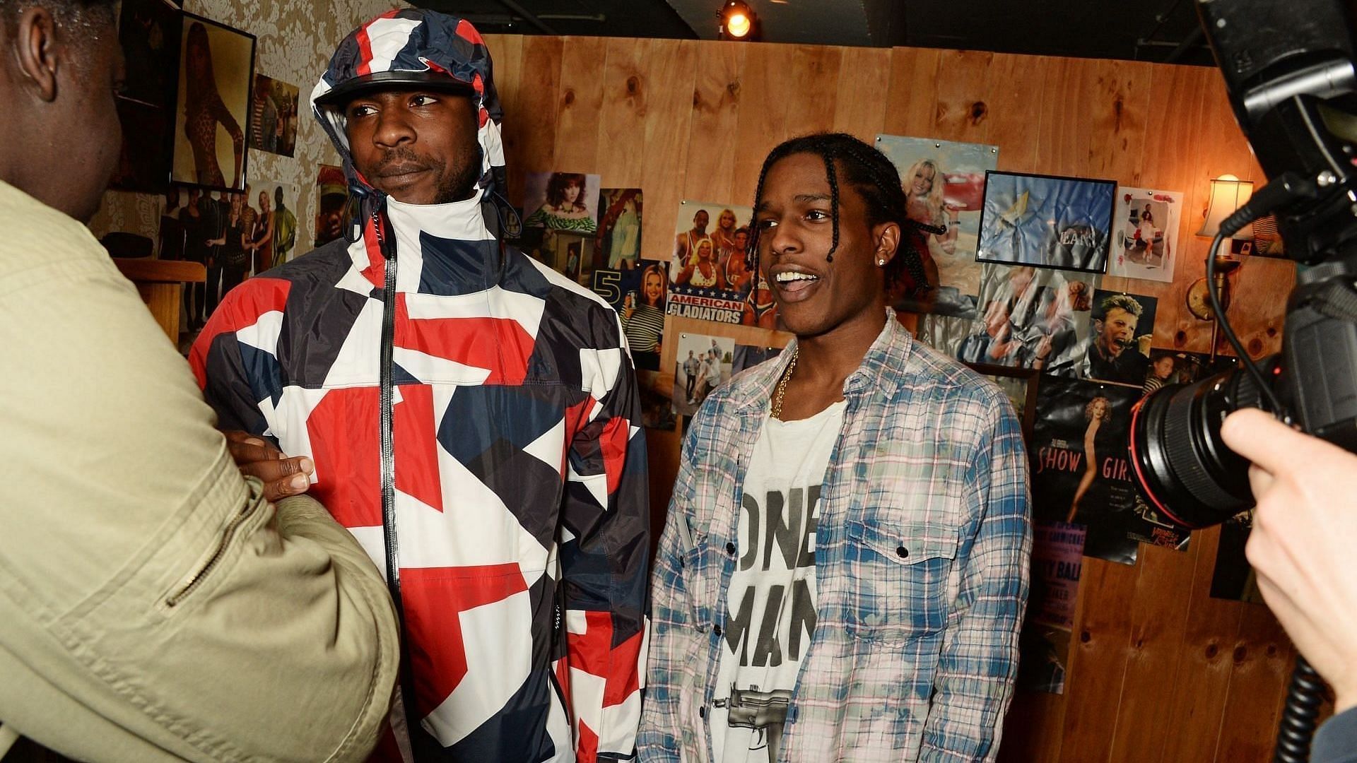 Skepta (L) and A$AP Rocky attend the launch of 1st GUESS Originals X A$AP Rocky collection within Selfridges on March 11, 2016, in London, England. (Image via Getty/David M. Benett)