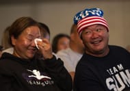 Yeev Thoj and John Lee, Sunisa Lee's parents - (Image via Getty)