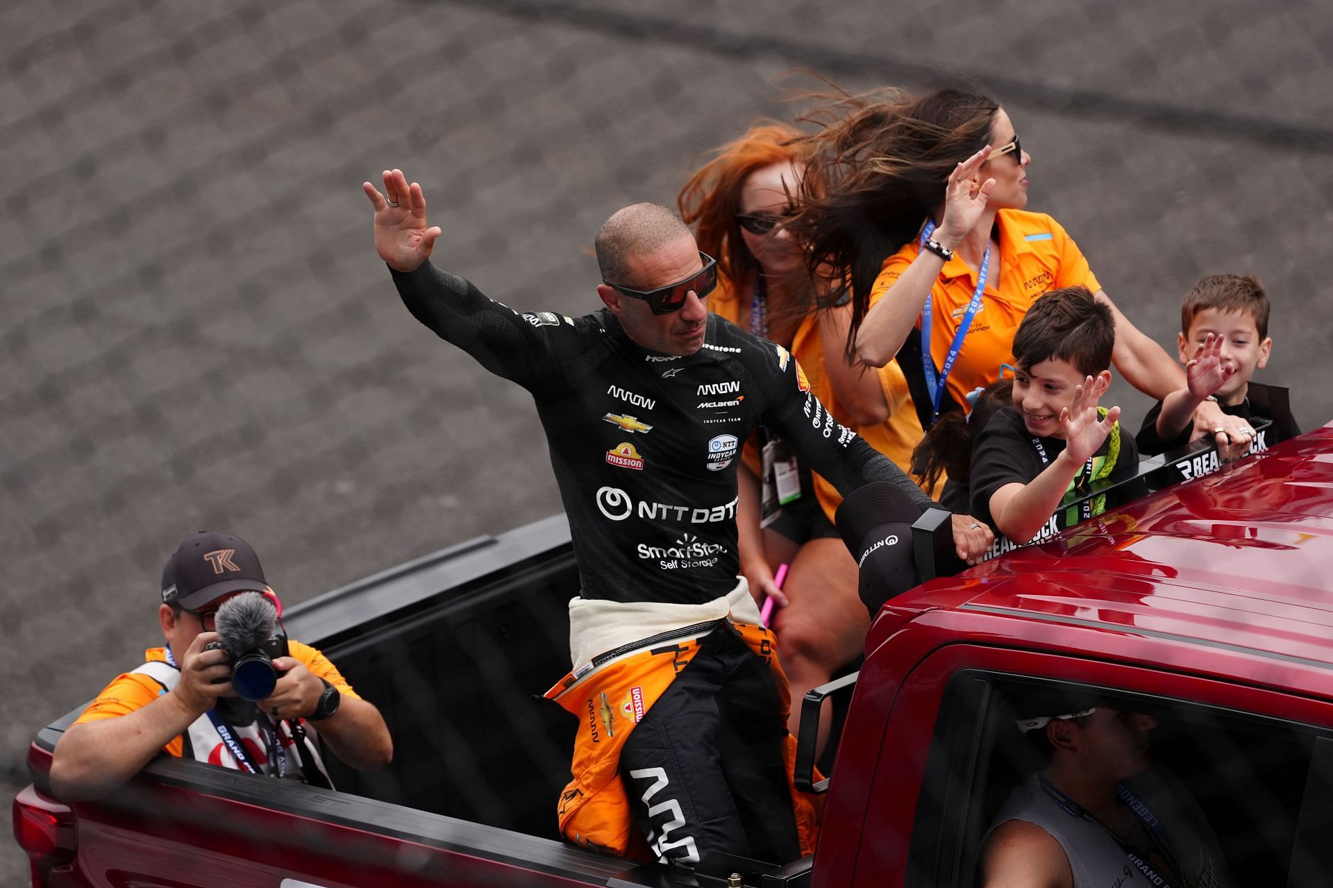 Tony Kanaan with his family during a parade lap at the 108th Running of the Indianapolis 500 - Source: Getty