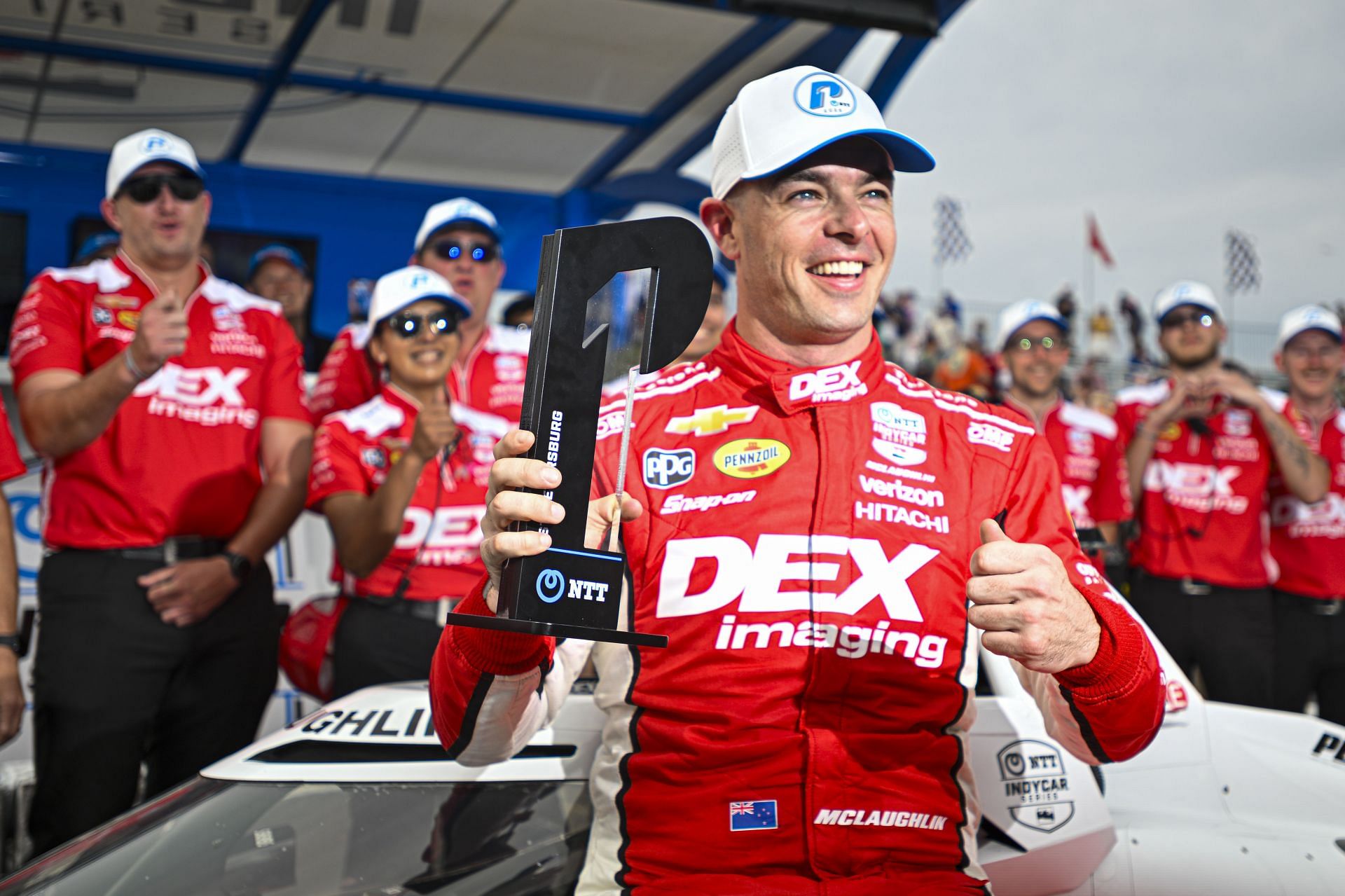 Scott McLaughlin posing with his Pole Position trophy at the Grand Prix of St. Petersburg - Source: Getty