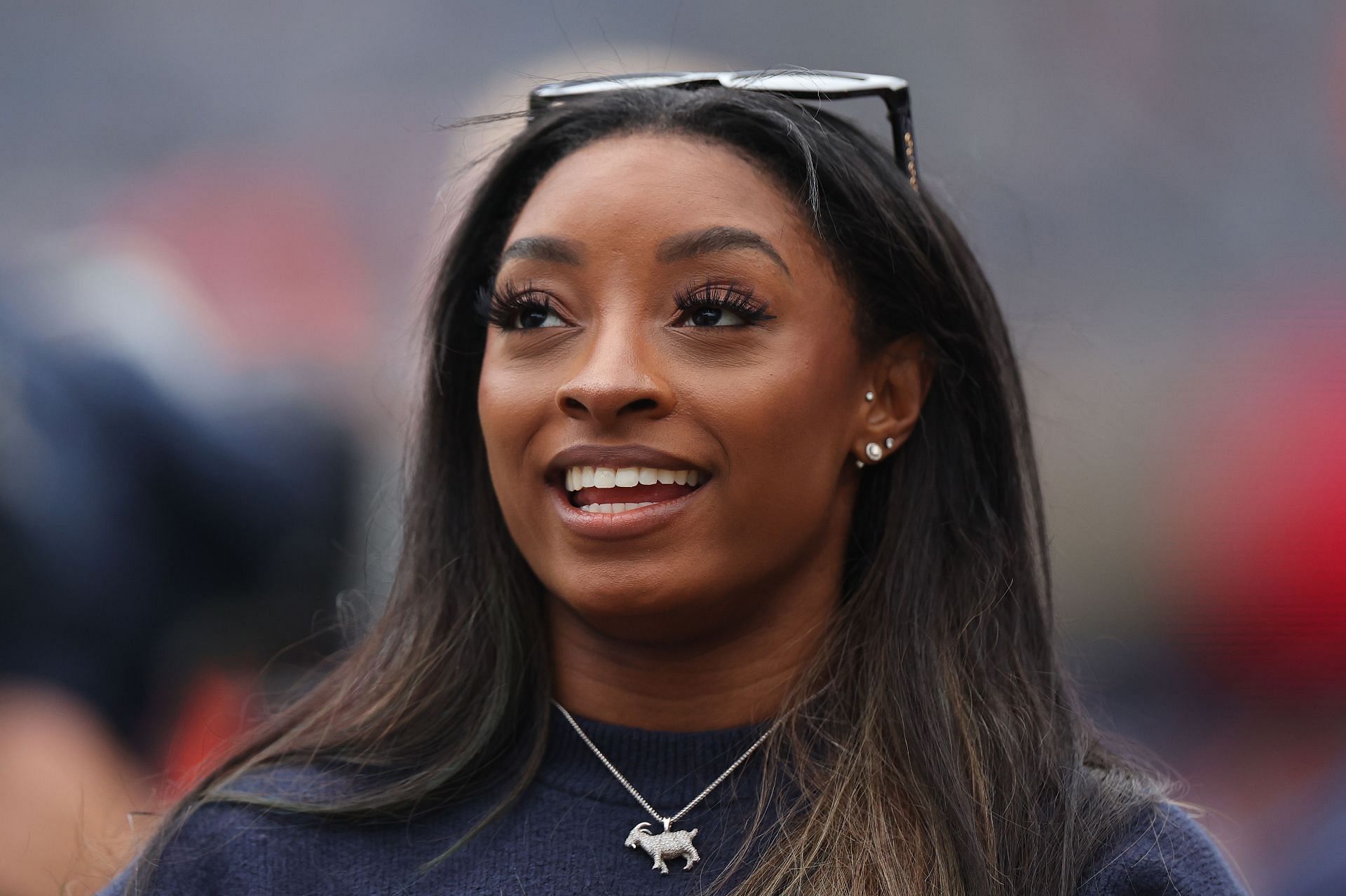 Simone Biles looks on during Los Angeles Rams v Chicago Bears - (Source: Getty)