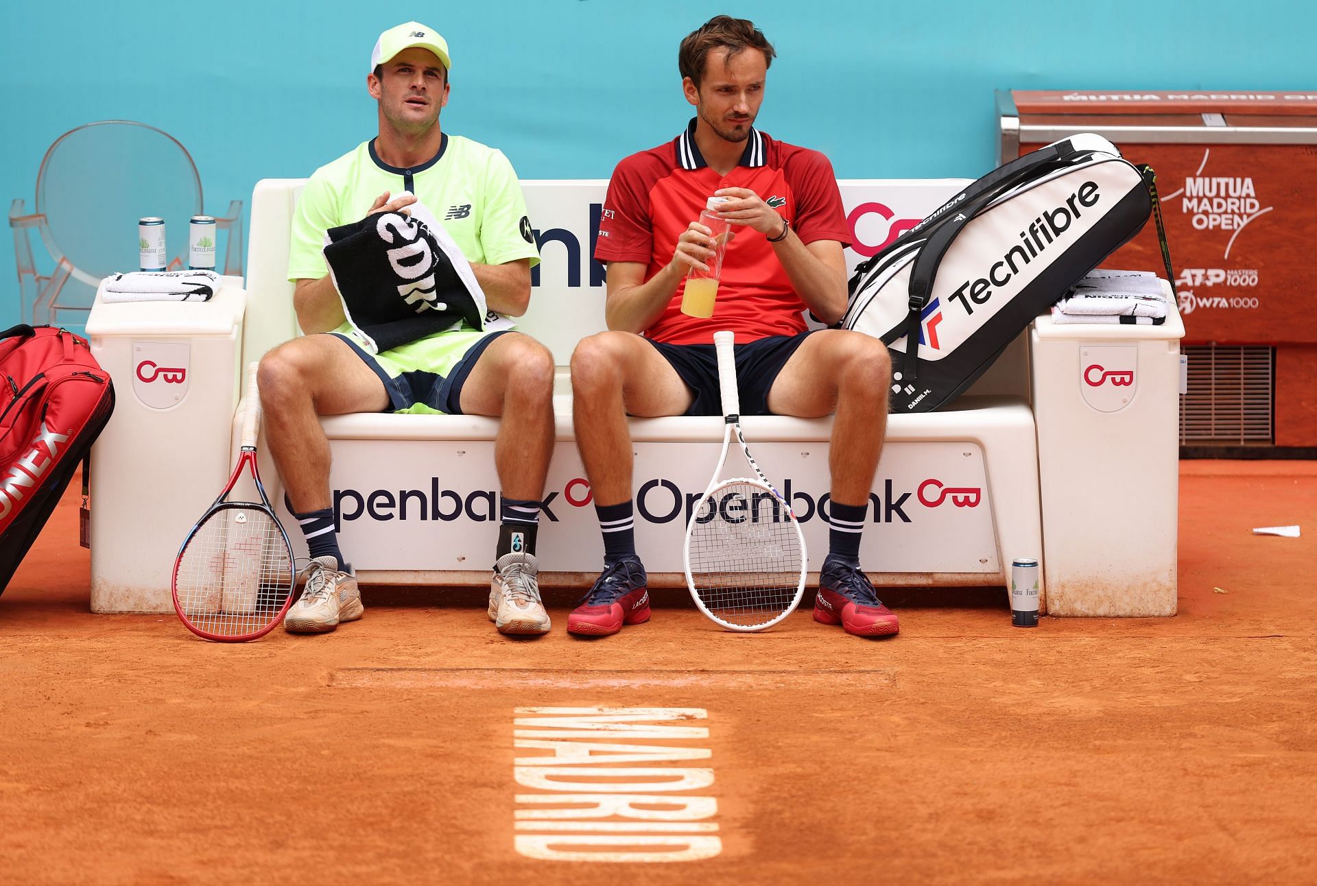 Tommy Paul (L) and Daniil Medvedev playing doubles at the Mutua Madrid Open - Source: Getty