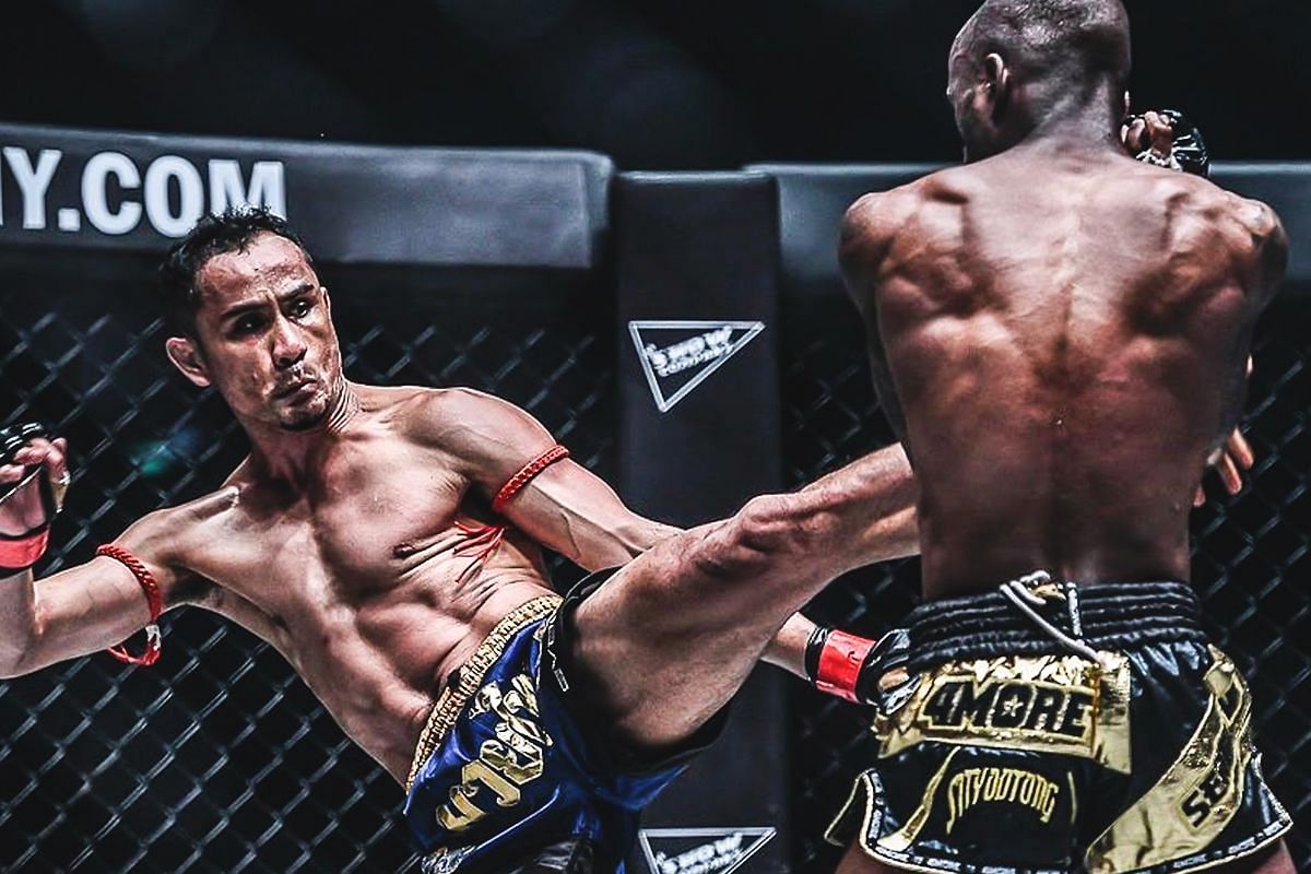 Sam-A (left) lands a kick on Sergio Wielzen [Photo via ONE Championship]