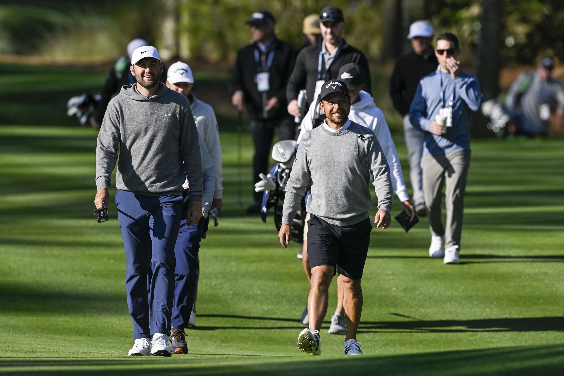 Scottie Scheffler and Xander Schauffele walk the 10th hole together before the 2025 Players Championship at TPC Sawgrass - Source: Getty