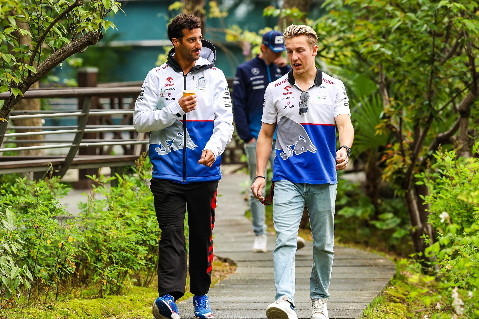 Daniel Ricciardo [L] with Liam Lawson [R] (Image Source: Getty)