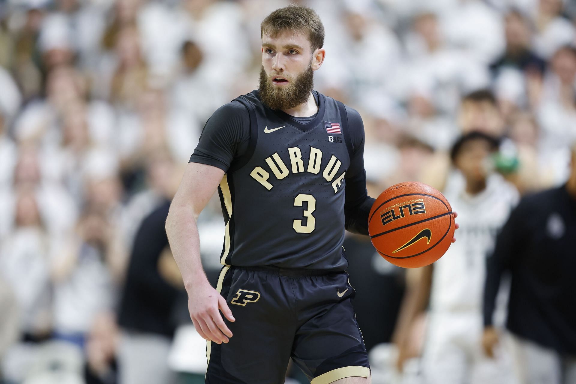 Braden Smith of the Purdue Boilermakers handles the ball during the second half against the Michigan State Spartans at Breslin Center on February 18, 2025. Photo: Getty