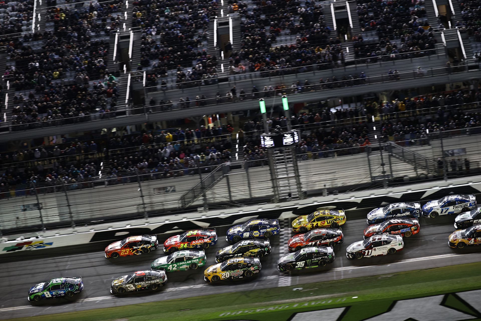 NASCAR Cup Series drivers racing at the 2025 Daytona 500 at the Daytona International Speedway - Source: Getty