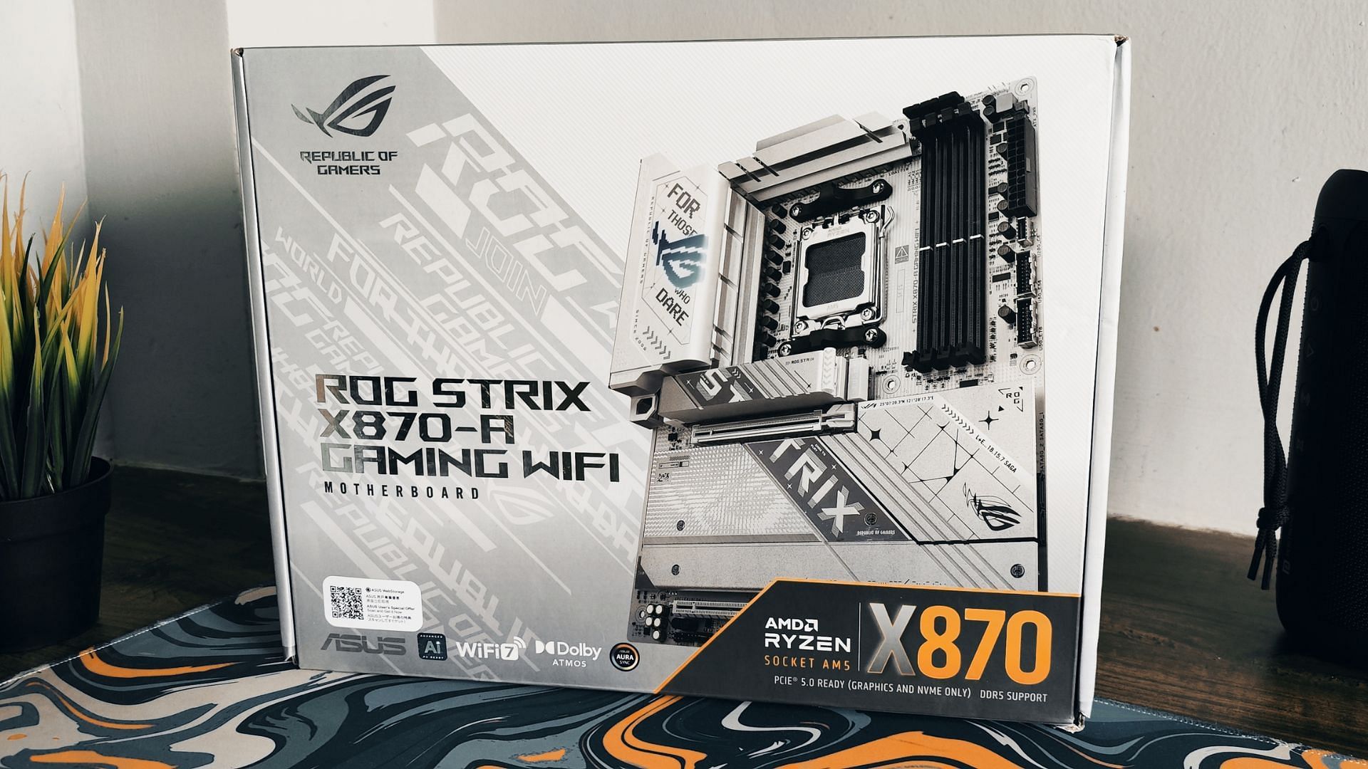 The ROG Strix X870-A is packaged in a minimalist box that reflects the aesthetics of the board (Image via Sportskeeda)