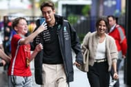 George Russell and Carmen Mundt arriving at the Australian Grand Prix, 2025 - Source: Getty