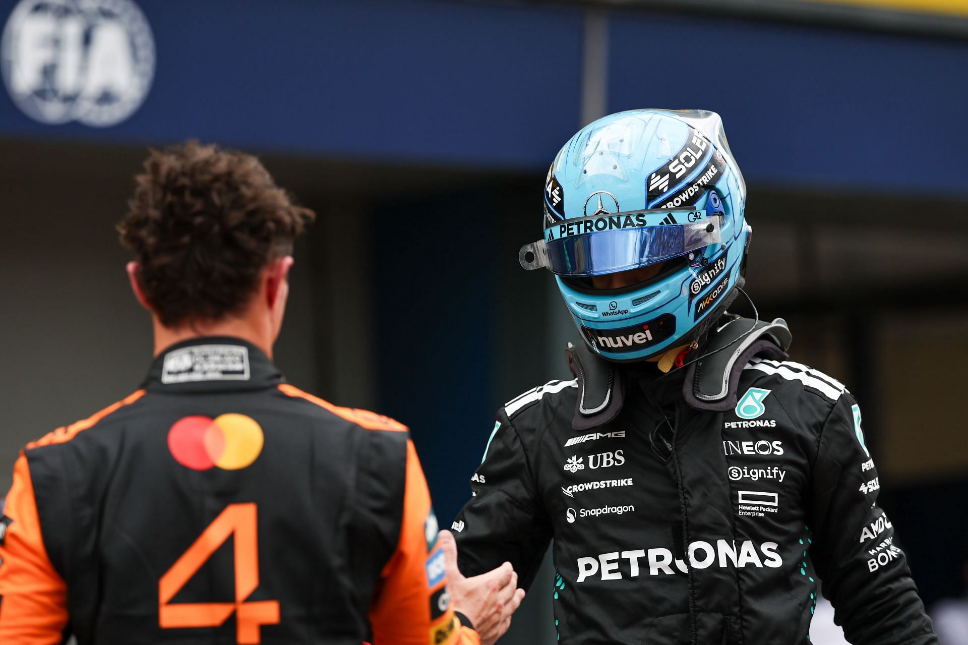 McLaren&#039;s Lando Norris [L] with Mercedes&#039; George Russell [R] (Image Source: Getty)