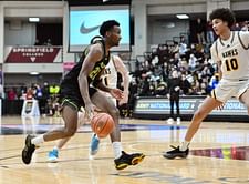 5-star signee and Naismith POY Darryn Peterson shares a moment from the James Naismith court at Kansas