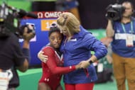 Simone Biles of the United States and her coach Aimee Boorman at the 2016 Olympic Games in Rio de Janeiro, Brazil. (Photo via Getty Images)