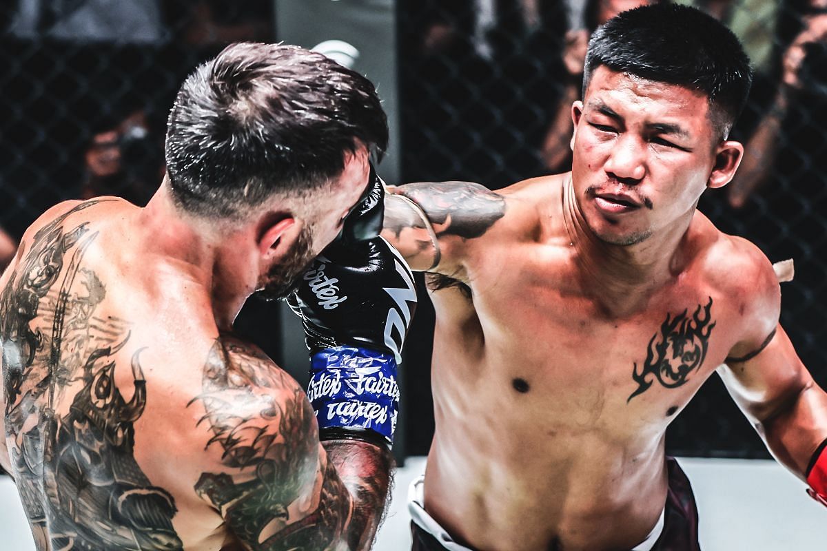 Rodtang (right) bulldozes Denis Puric in their matchup [Photo via ONE Championship]